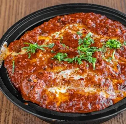 Fresh-made pizza at ClubHouse Pizza & Chicken Winnipeg